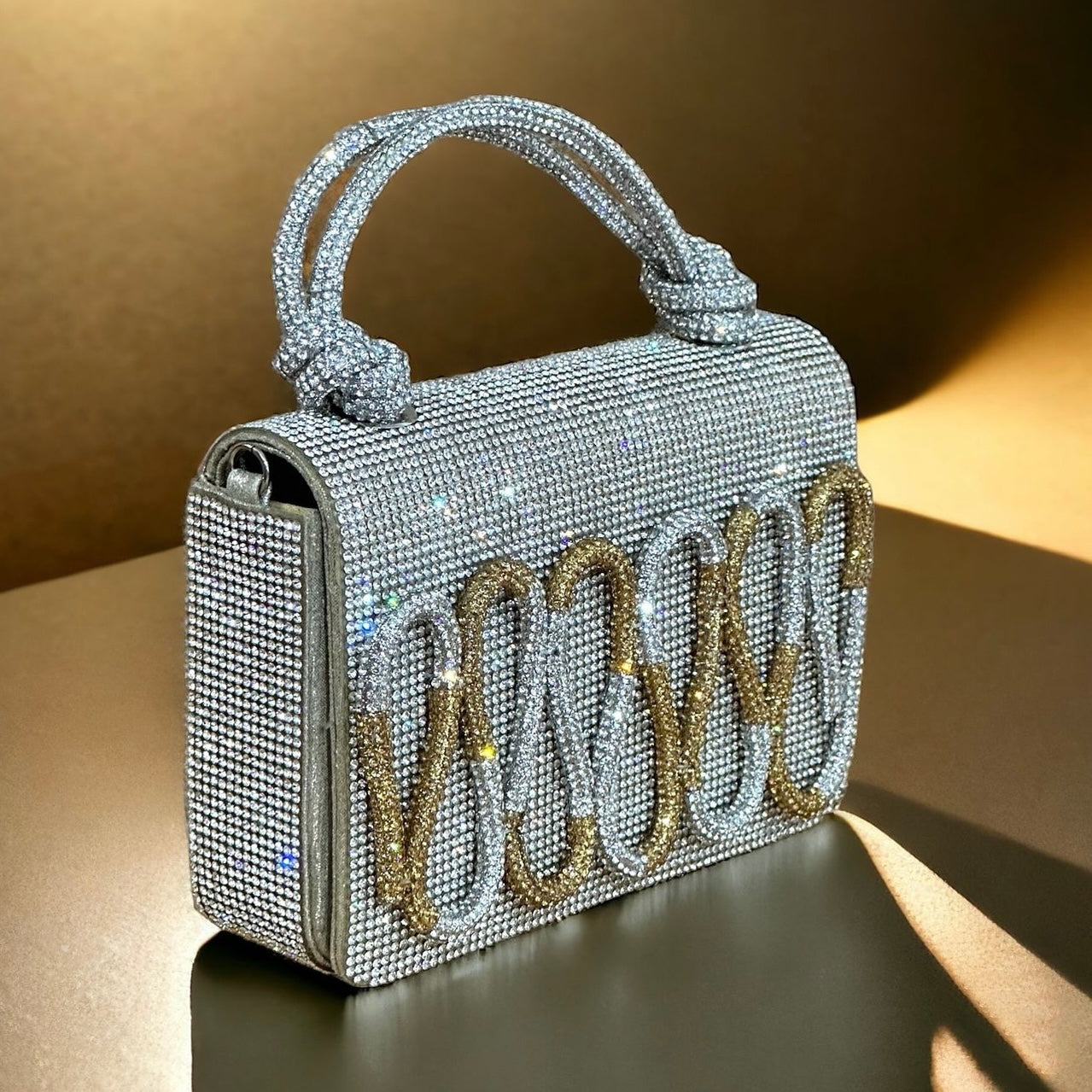 VELMA’S MILLINERY SILVER BAG